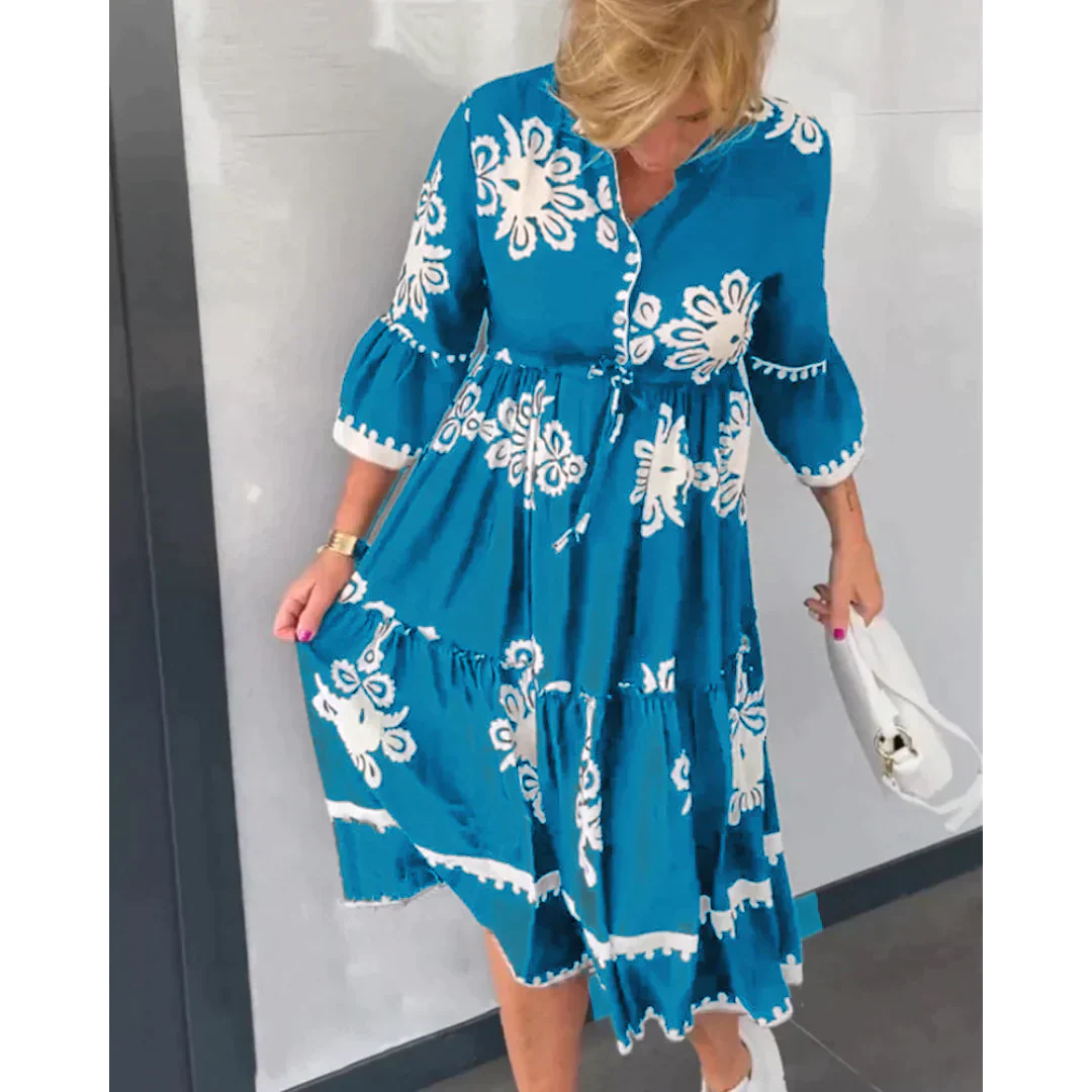 Luchtige bloemenjurk met 3/4 mouwen en flatterende pasvorm – FloréaLune Dress