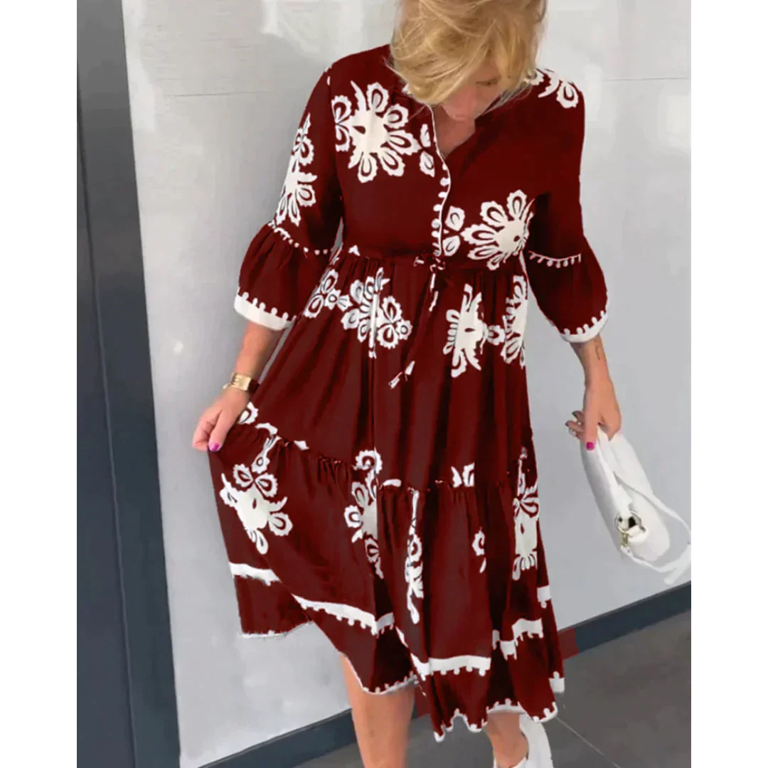 Luchtige bloemenjurk met 3/4 mouwen en flatterende pasvorm – FloréaLune Dress