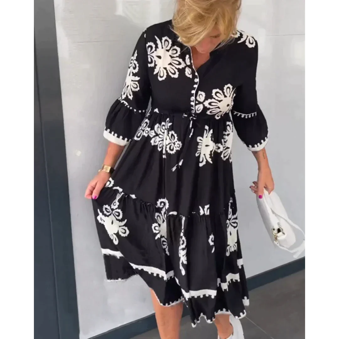Luchtige bloemenjurk met 3/4 mouwen en flatterende pasvorm – FloréaLune Dress