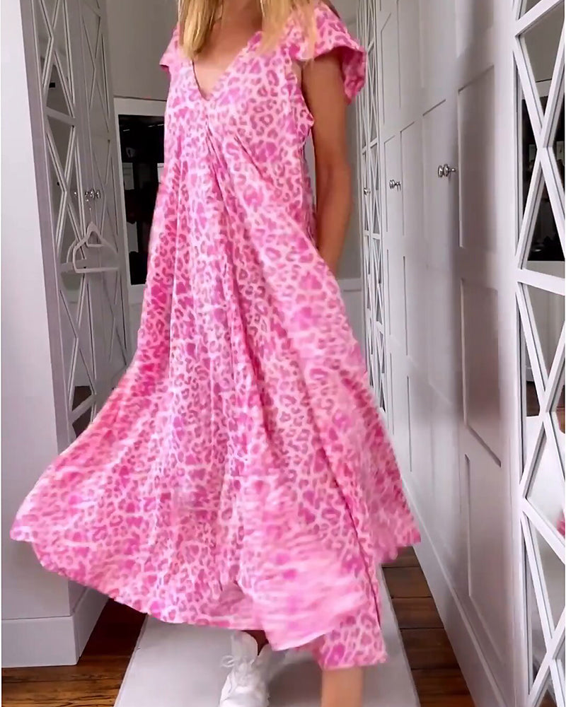 Luchtige Jurk Met V-hals En Speelse Print Voor Zomerse Dagen – TYRENE LIGHT