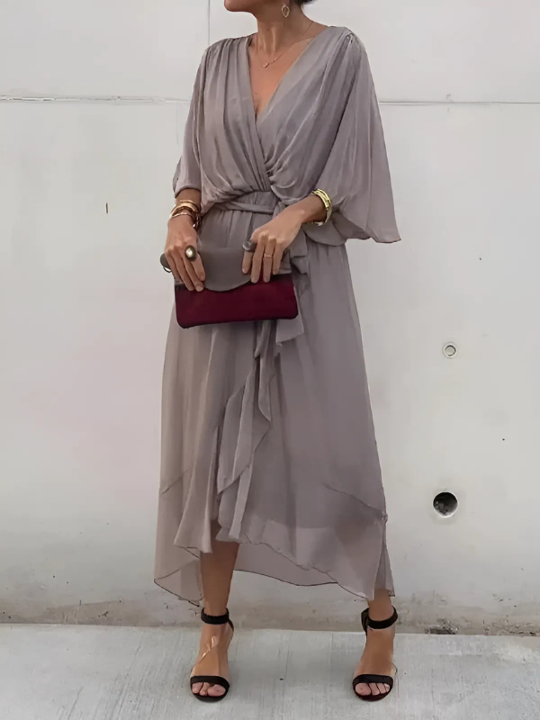 ALVINA – Elegante midi wikkeljurk die je silhouet omarmt
