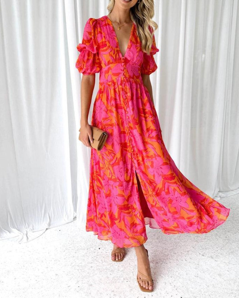 Maxi damesjurk in rood-roze tinten met zwierige pasvorm – Floriva Rouge