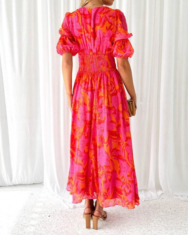 Maxi damesjurk in rood-roze tinten met zwierige pasvorm – Floriva Rouge
