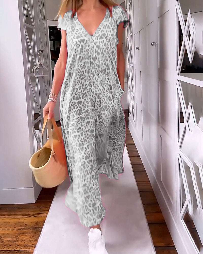 Luchtige Jurk Met V-hals En Speelse Print Voor Zomerse Dagen – TYRENE LIGHT
