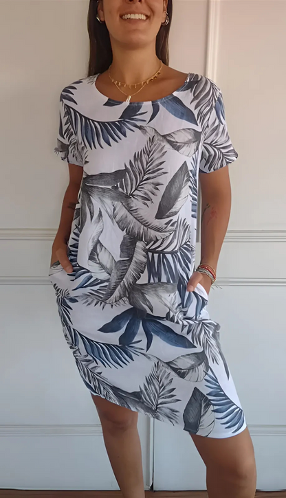 Vrouwelijke midi-jurk met bloemenprint en lange mouwen – NoreliaBloom
