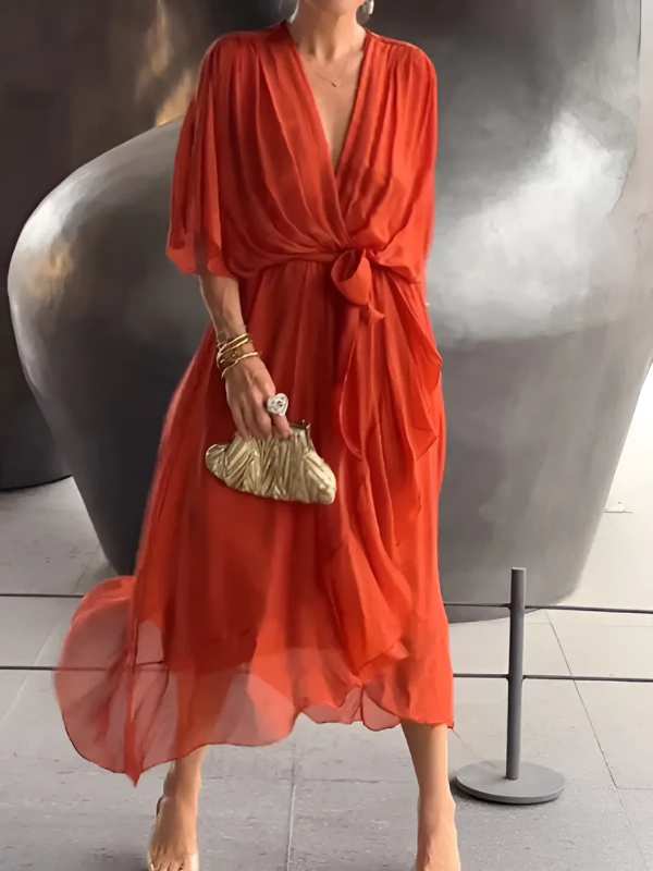 ALVINA – Elegante midi wikkeljurk die je silhouet omarmt