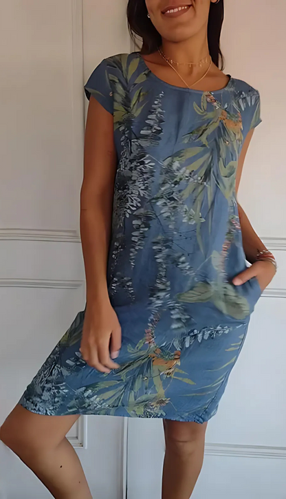 Vrouwelijke midi-jurk met bloemenprint en lange mouwen – NoreliaBloom