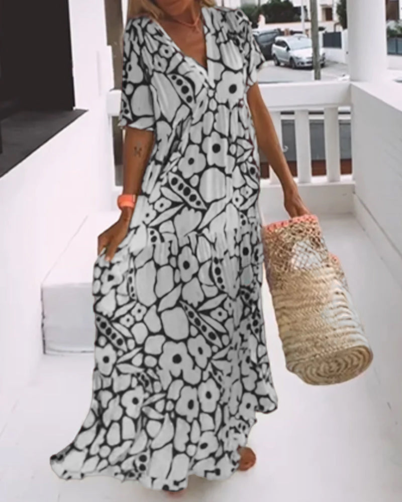 Luchtige Maxi-Jurk Met Abstracte Bloemenprint Voor Zomerse Vrijheid – MELANIA ARTISTIQUE