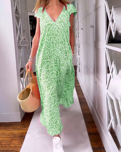Luchtige Jurk Met V-hals En Speelse Print Voor Zomerse Dagen – TYRENE LIGHT
